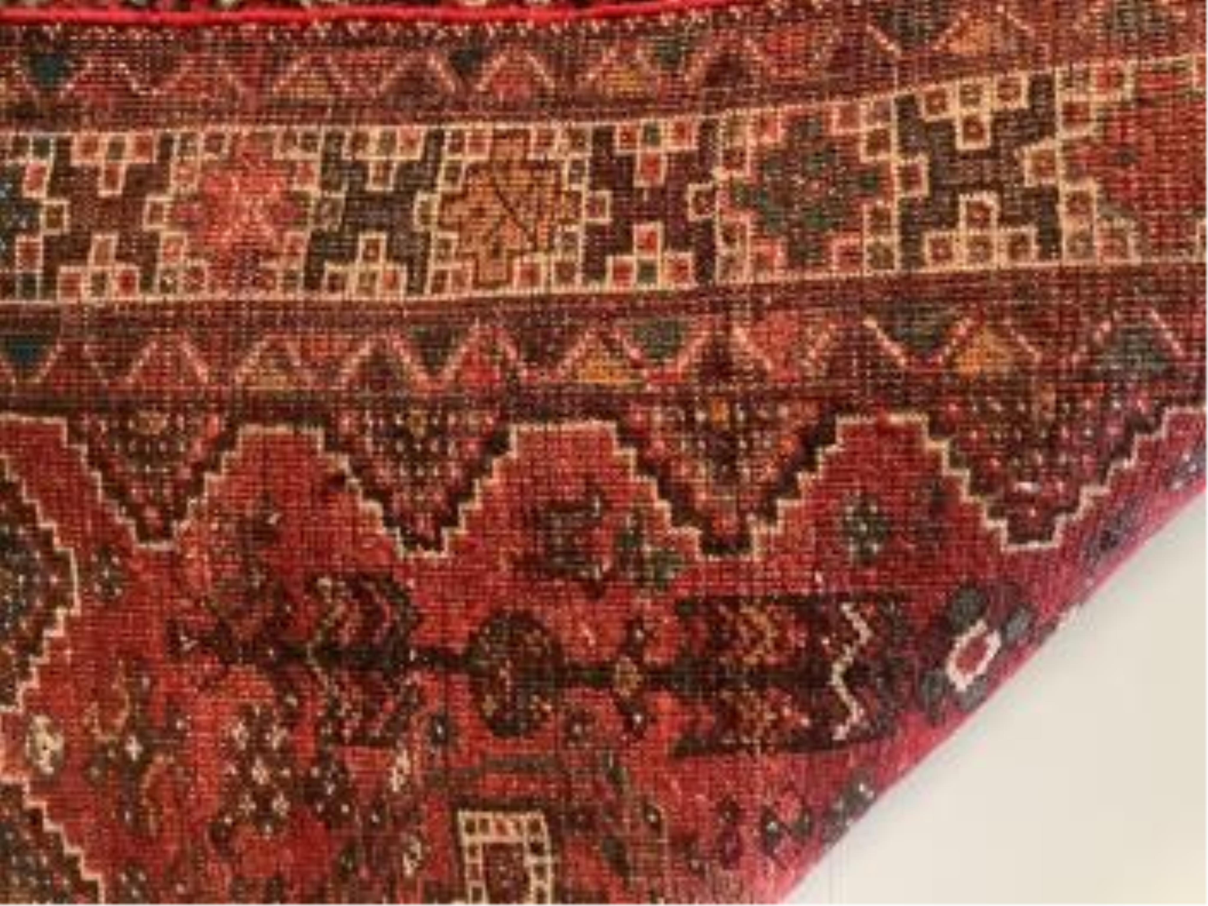 A Hamadan red ground rug, 196 x 154cm. Condition - poor to fair